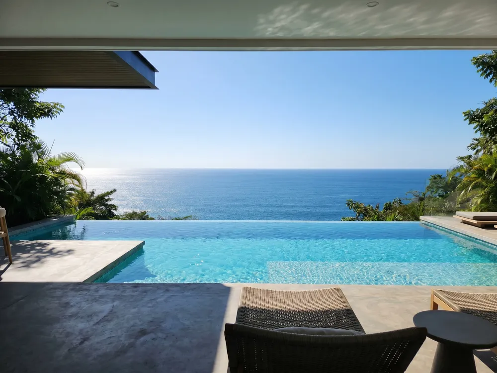 Private infinity-edge villa pool overlooking the Pacific Ocean at El Alto OceanView Residences, El Zonte, El Salvador